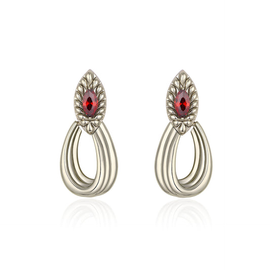 French designer's original geometric drop-set red zircon earrings