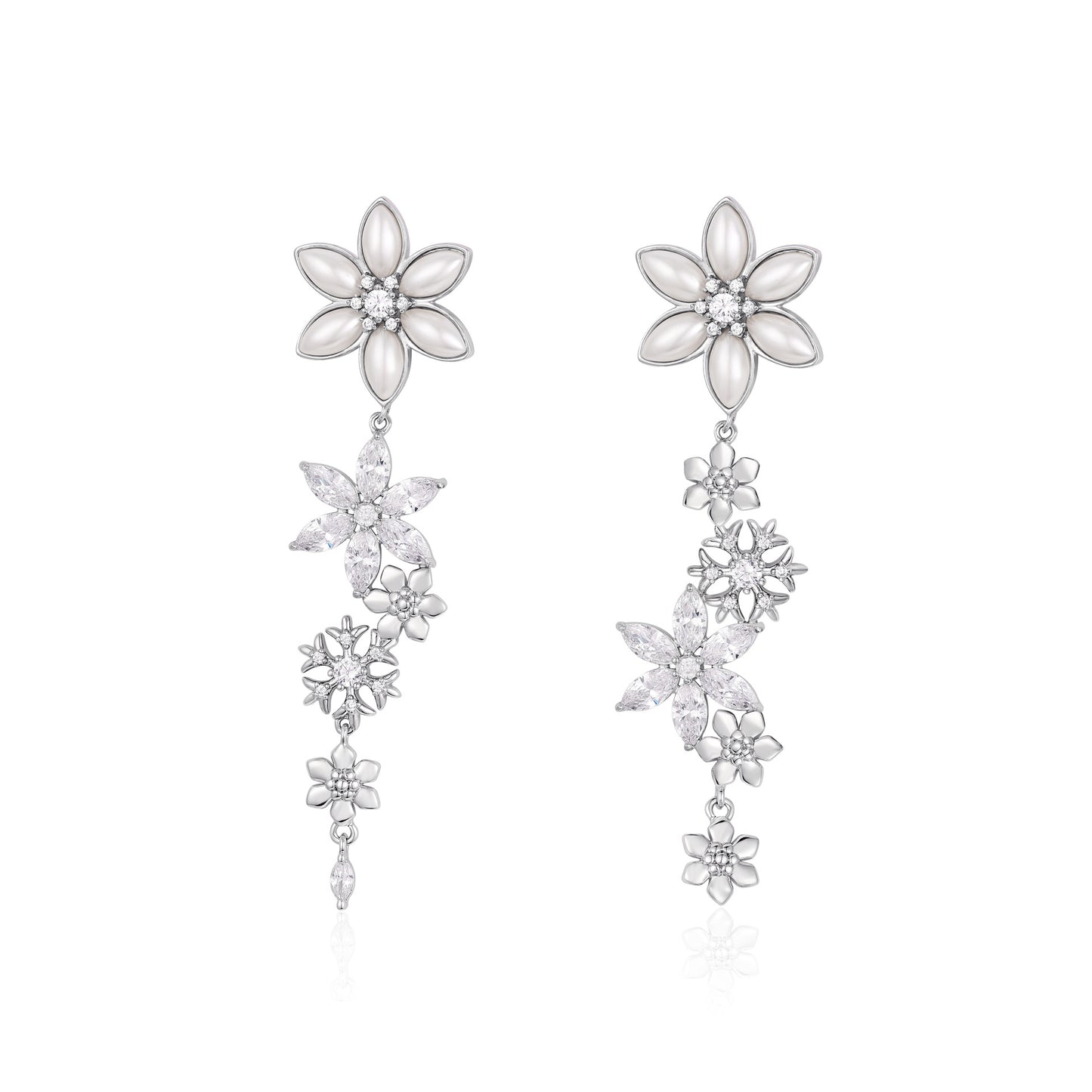 French designer's original snowflake series studded earrings with diamonds