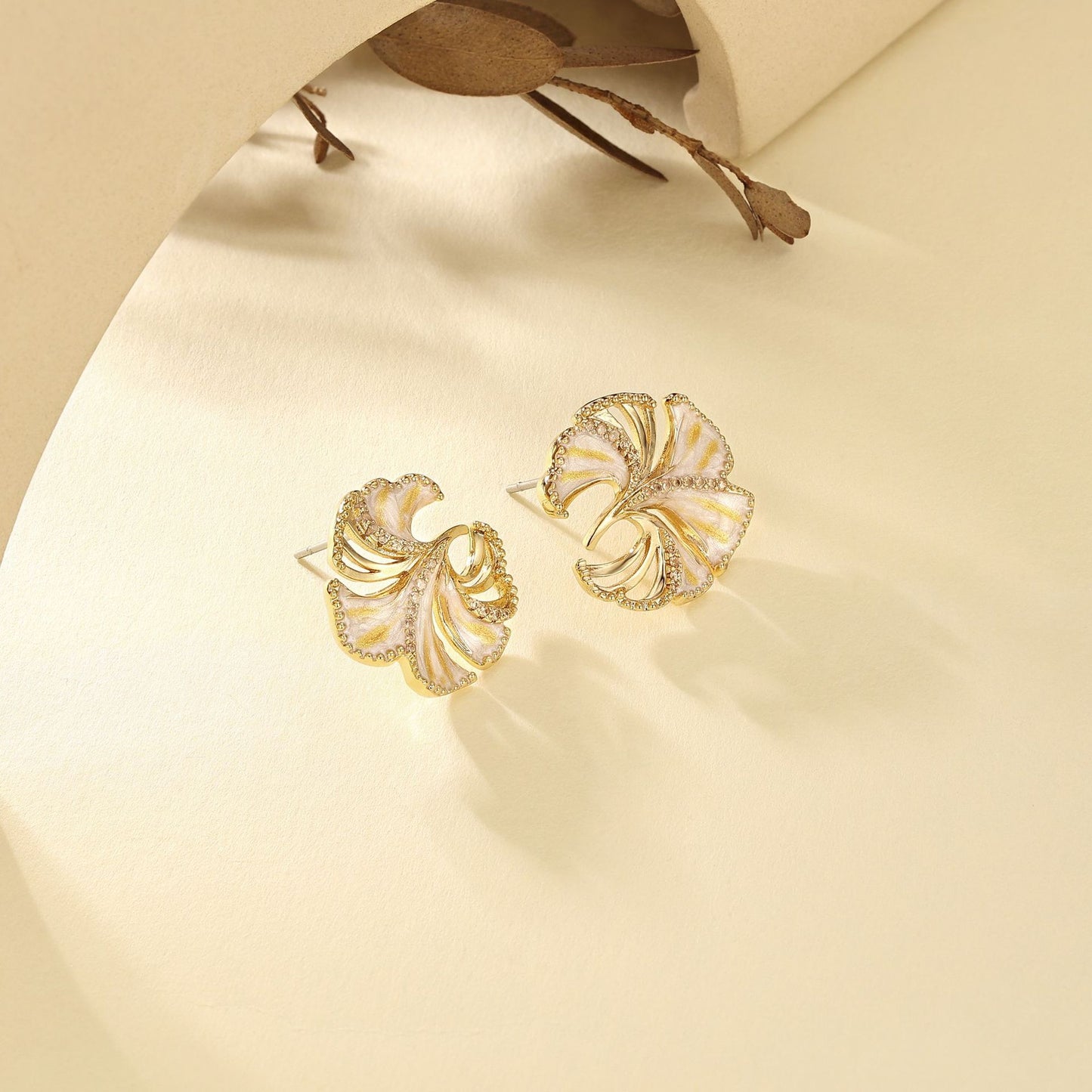 French designer ginkgo leaf simple hollow diamond design earrings