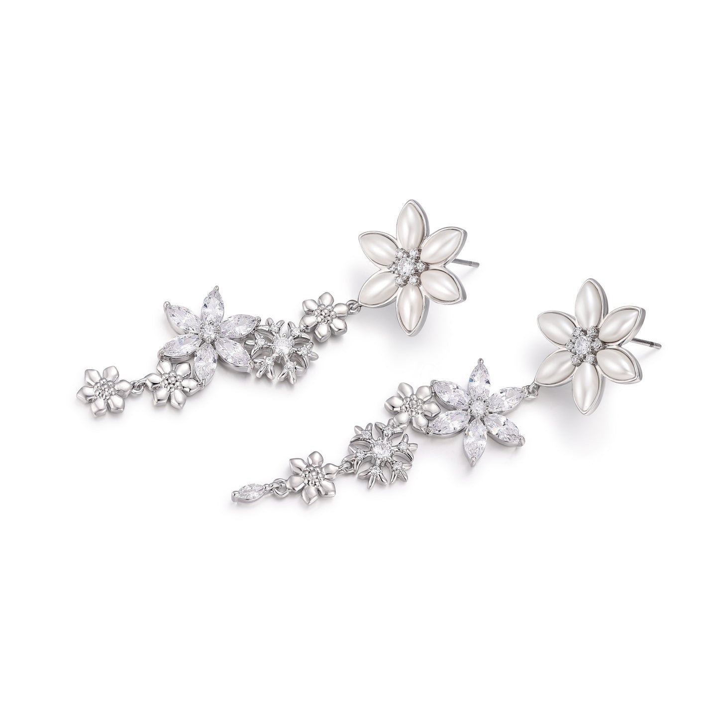 French designer's original snowflake series studded earrings with diamonds