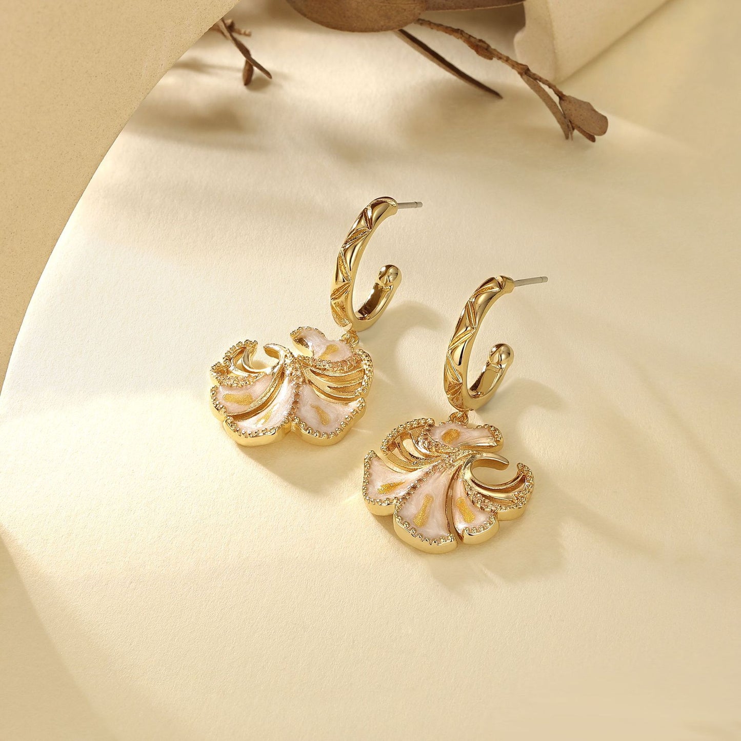 French designer's new ginkgo leaf earrings