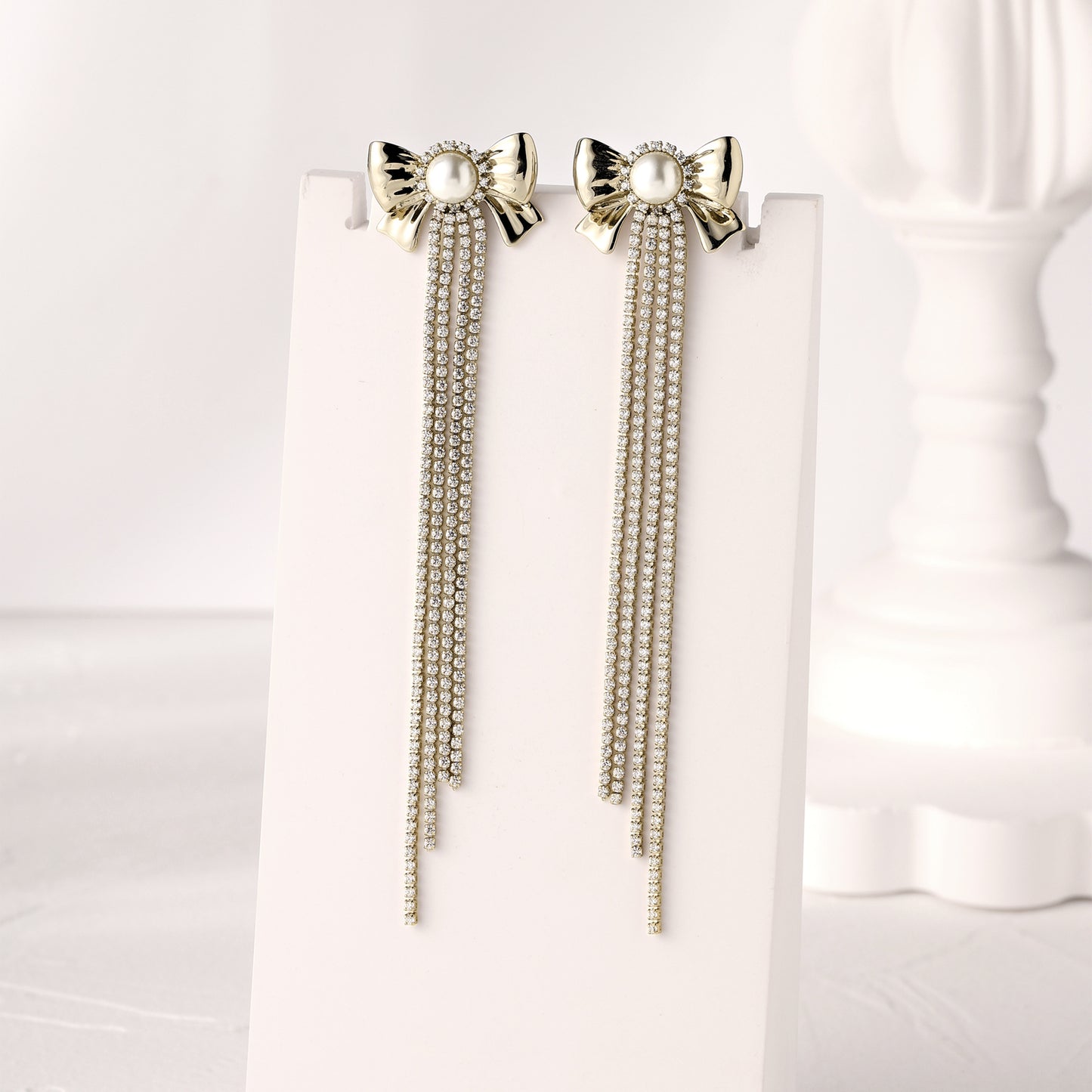 German designer bow pearl earrings