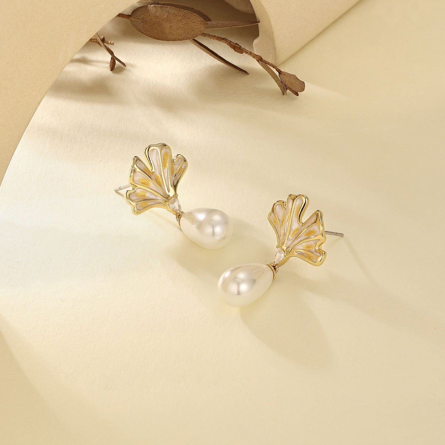 French designer gold ginkgo leaf enamel stud earrings