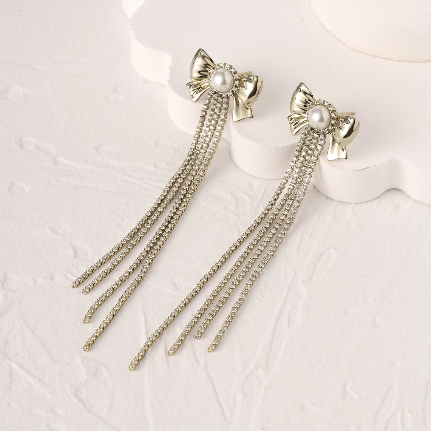 German designer bow pearl earrings