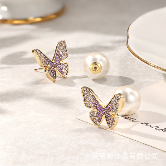 Greek designer butterfly stud earrings with purple zircon