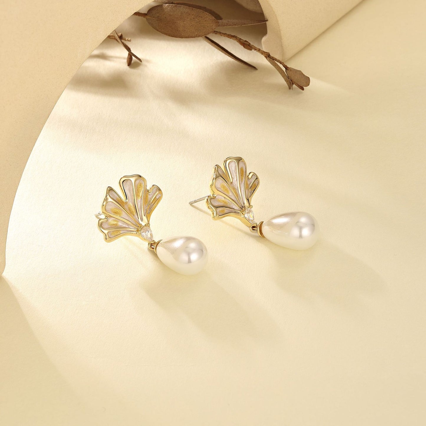 French designer gold ginkgo leaf enamel stud earrings