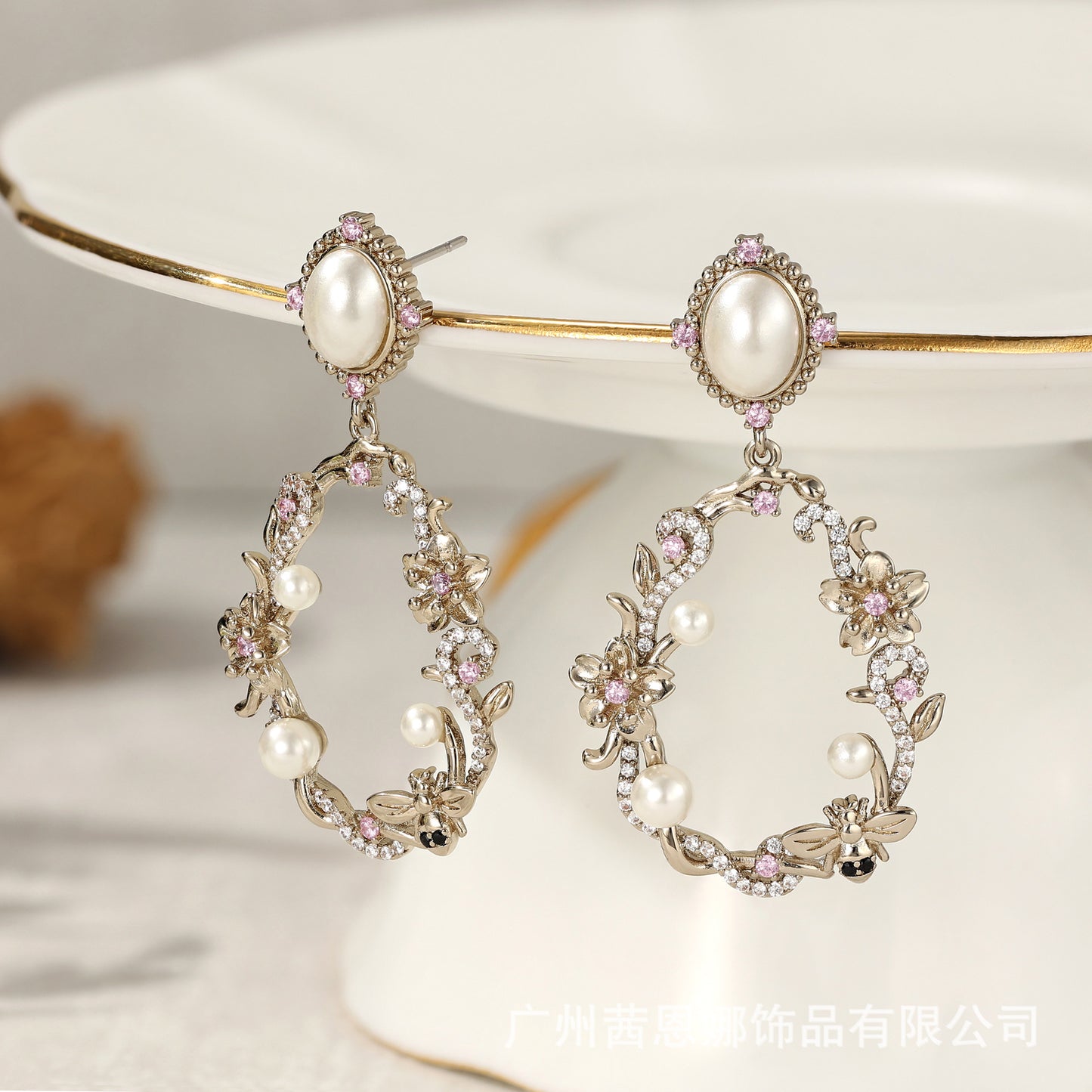 French designer's Morning Cherry Blossom series earrings