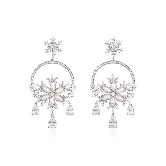 French designer Snowflake collection studded with diamond earrings