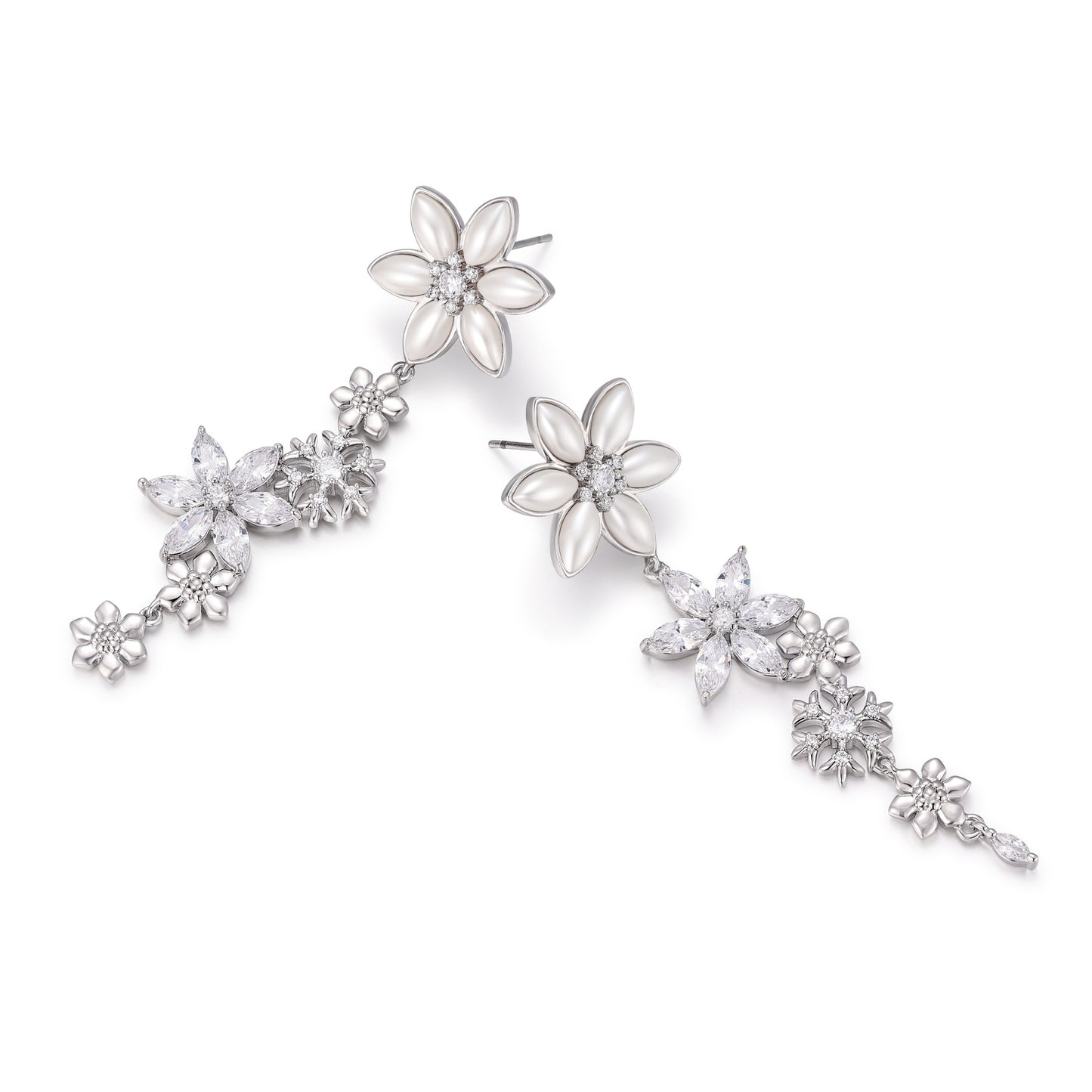 French designer's original snowflake series studded earrings with diamonds