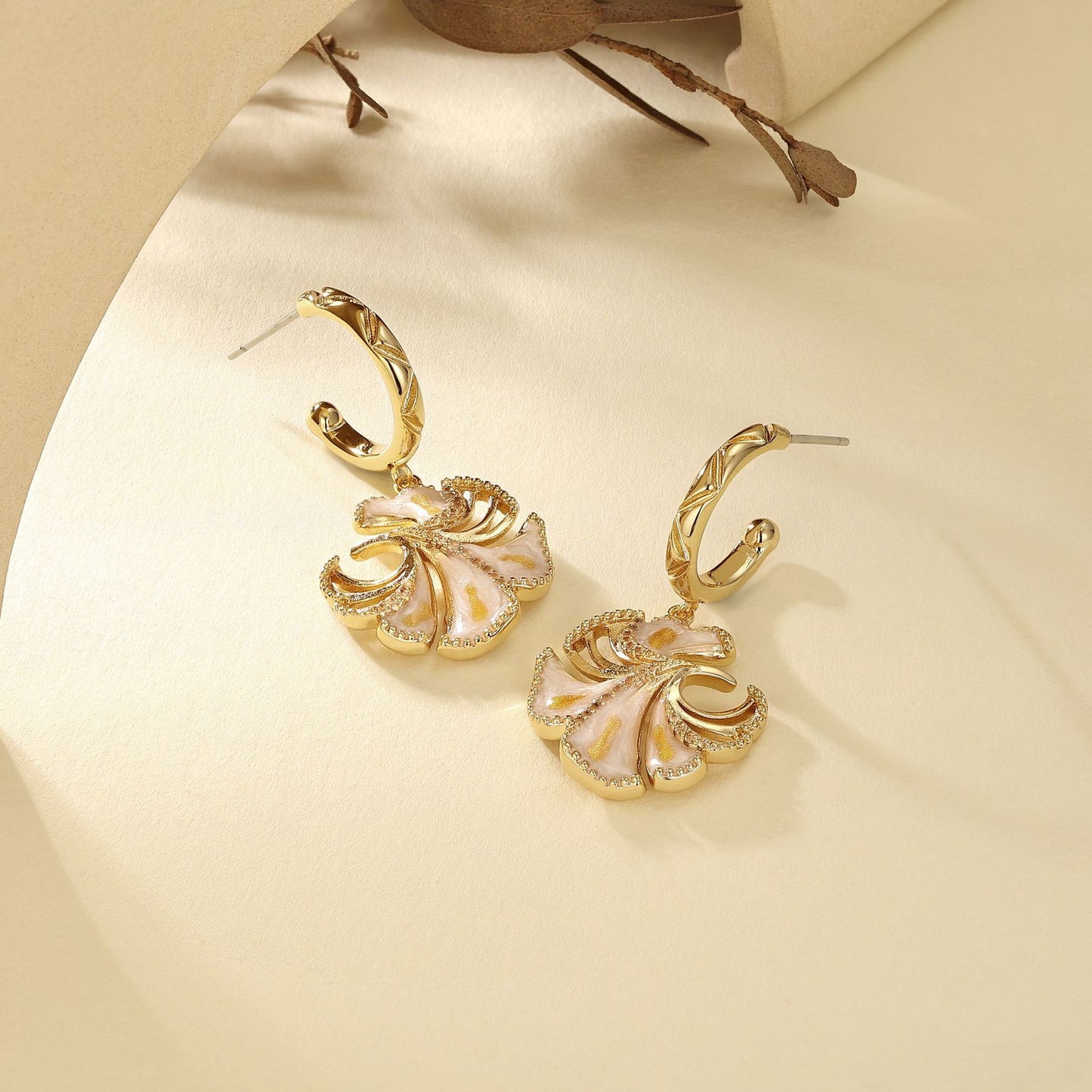 French designer's new ginkgo leaf earrings