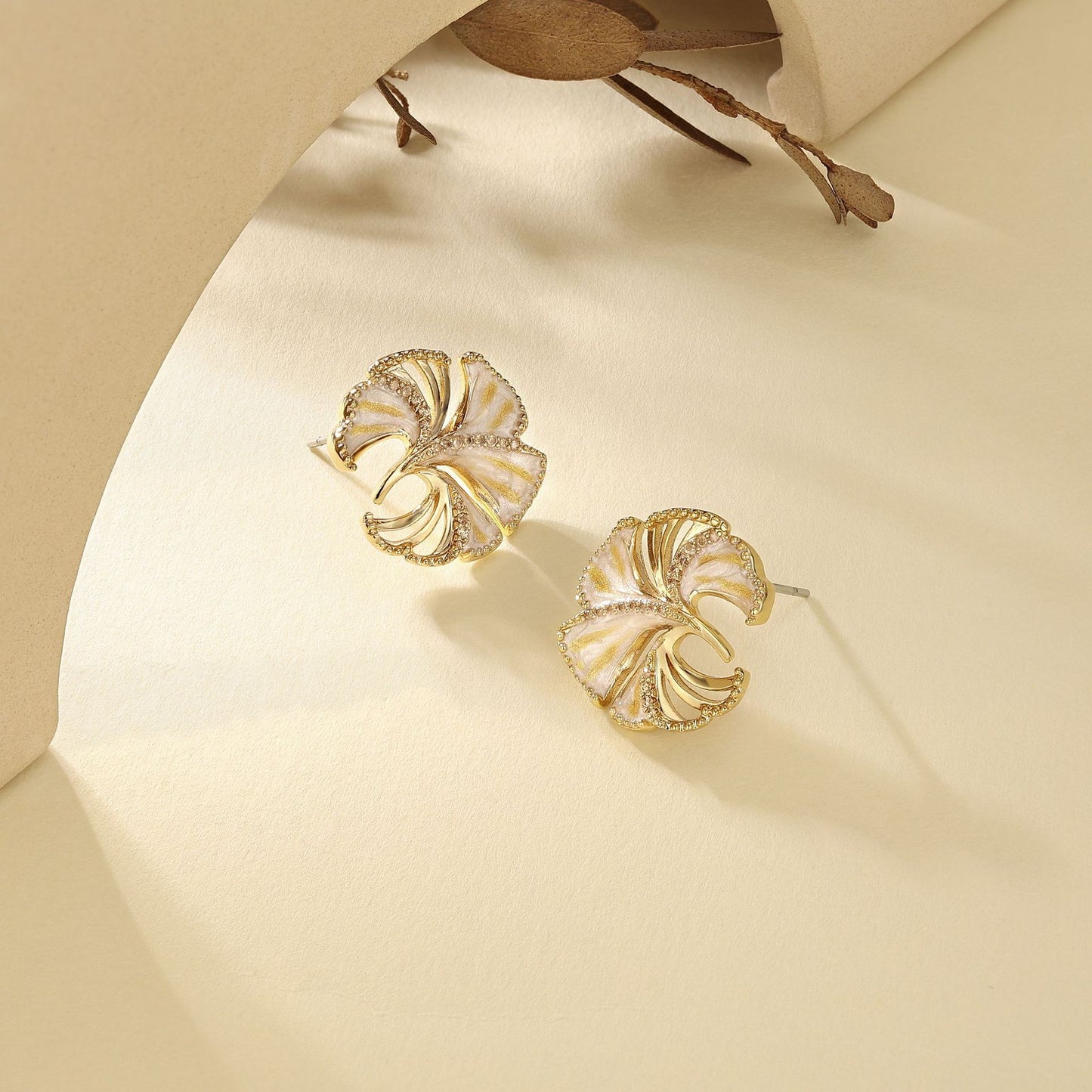 French designer ginkgo leaf simple hollow diamond design earrings