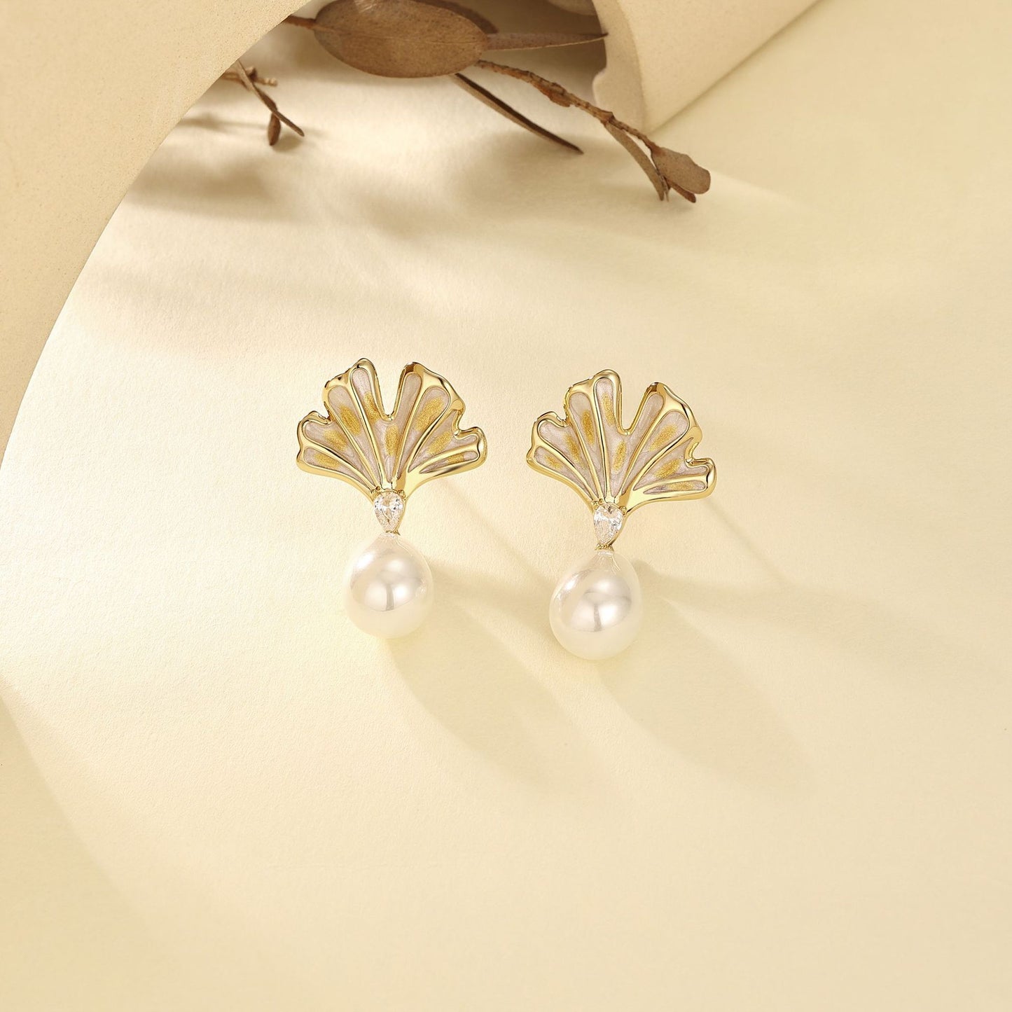 French designer gold ginkgo leaf enamel stud earrings