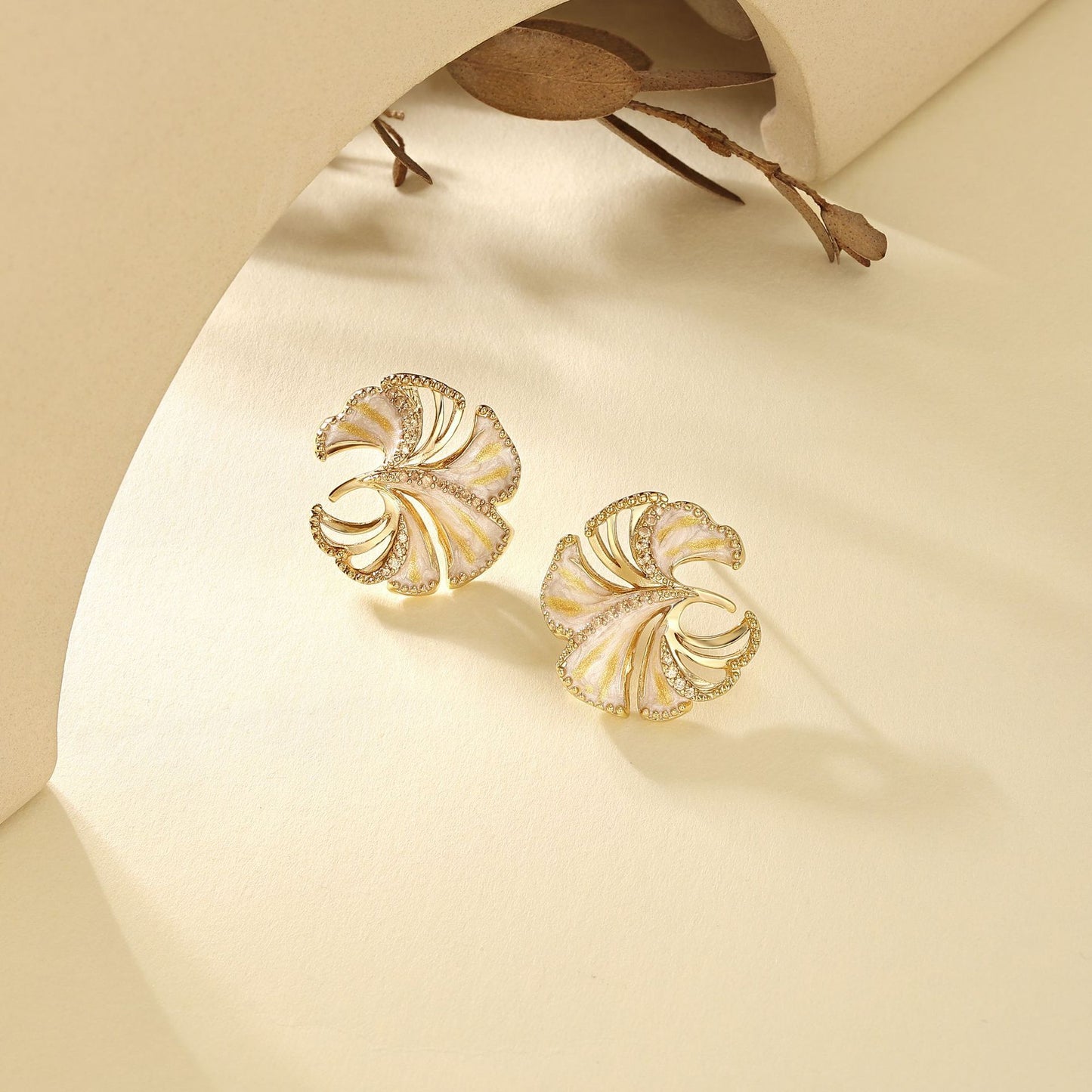 French designer ginkgo leaf simple hollow diamond design earrings