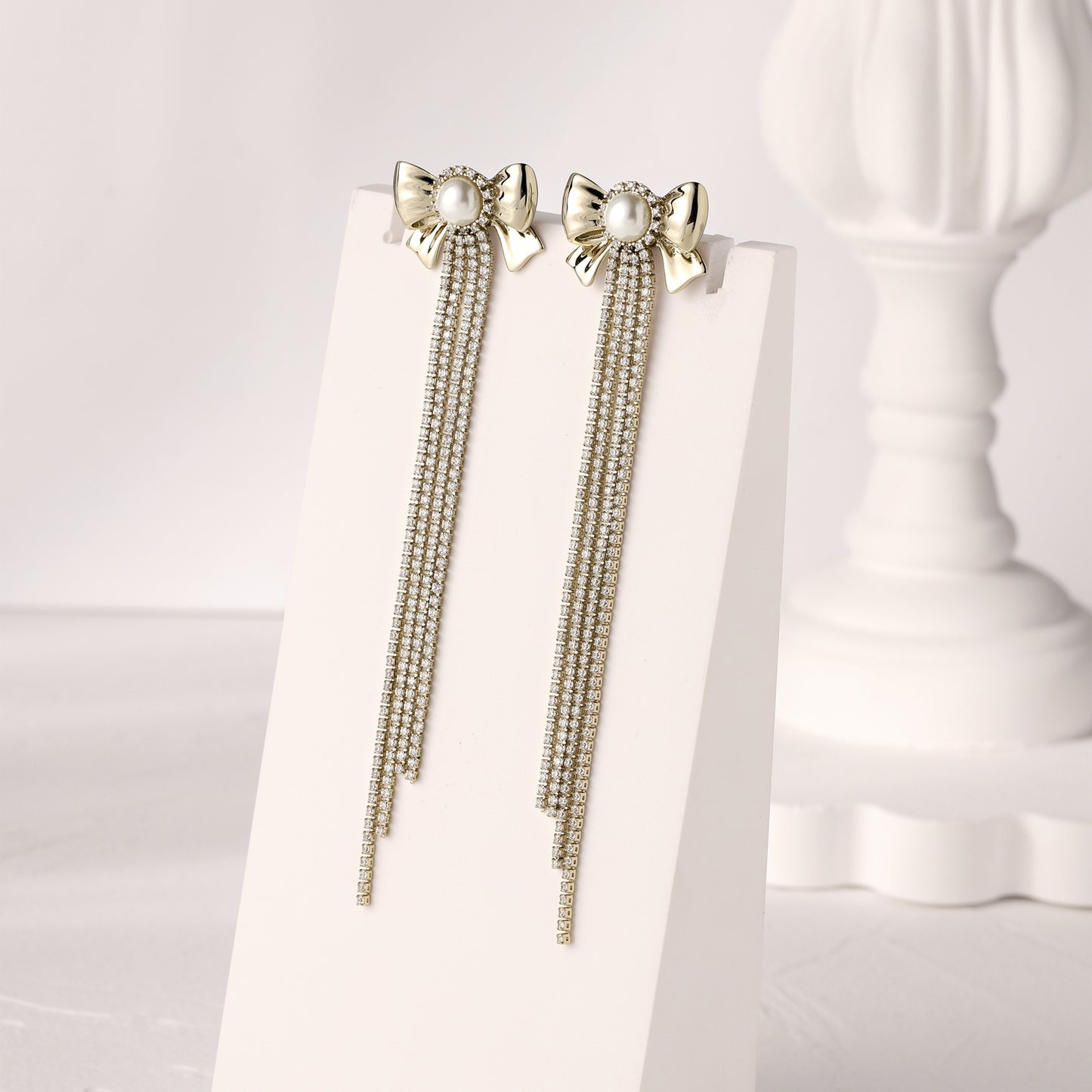 German designer bow pearl earrings