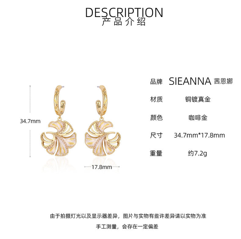 French designer's new ginkgo leaf earrings