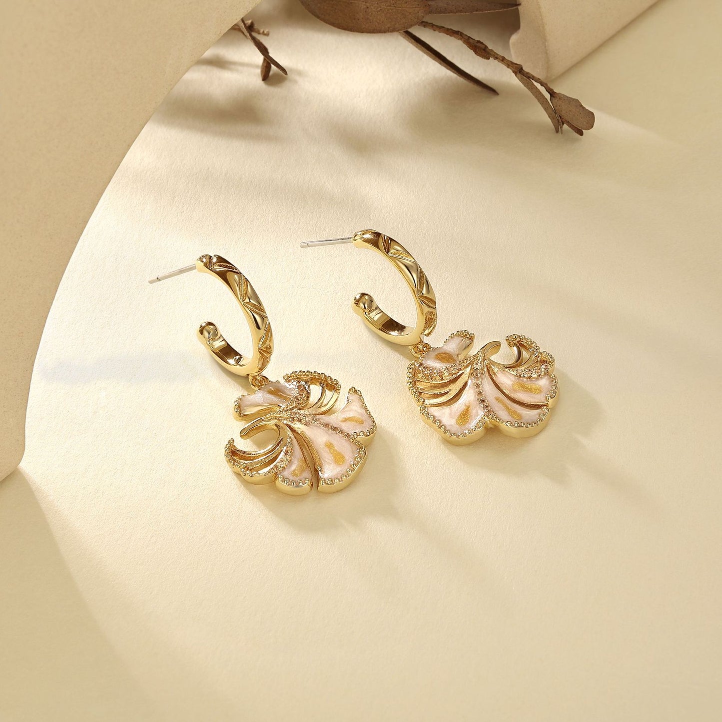 French designer's new ginkgo leaf earrings