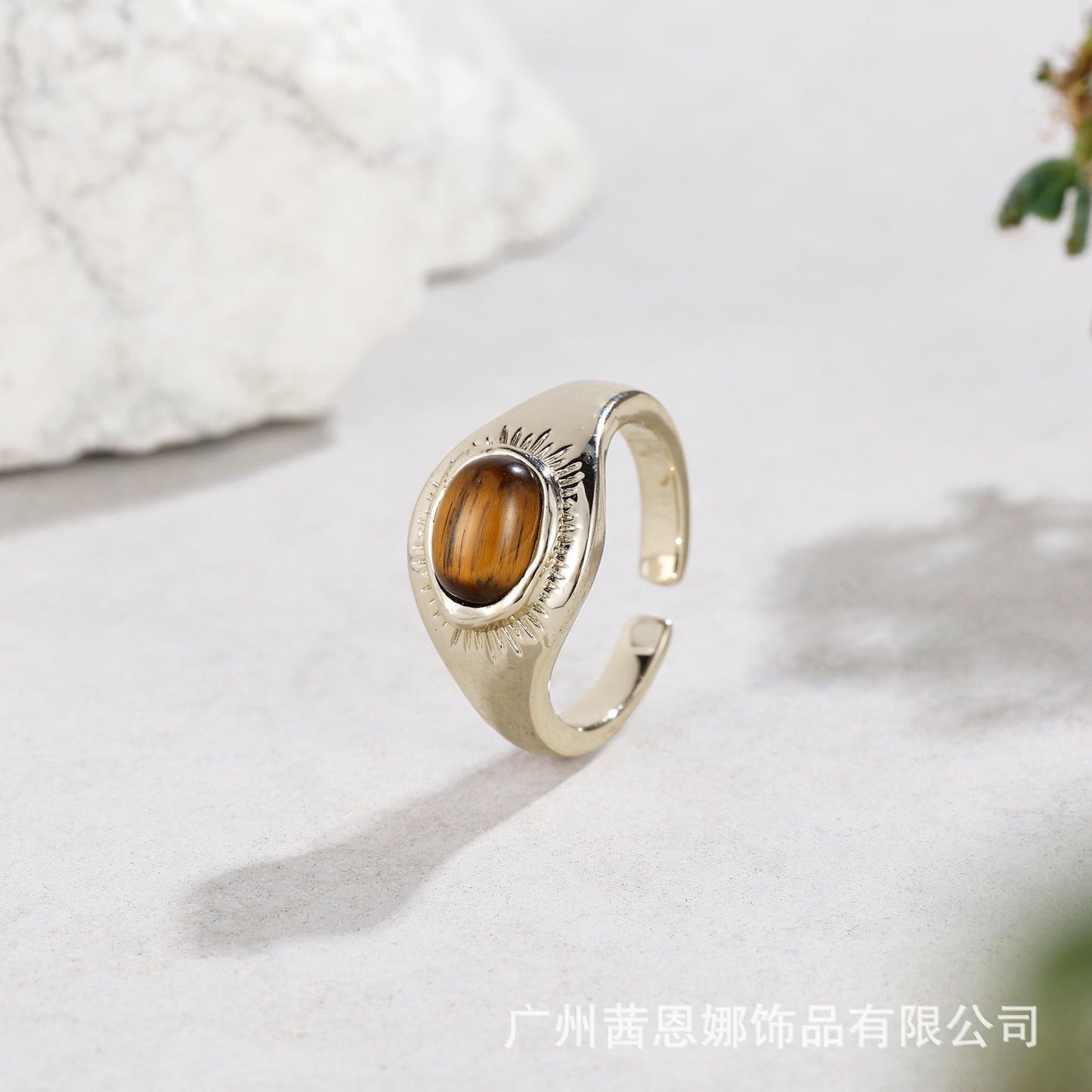 Portuguese designer’s original tiger eye stone textured open ring