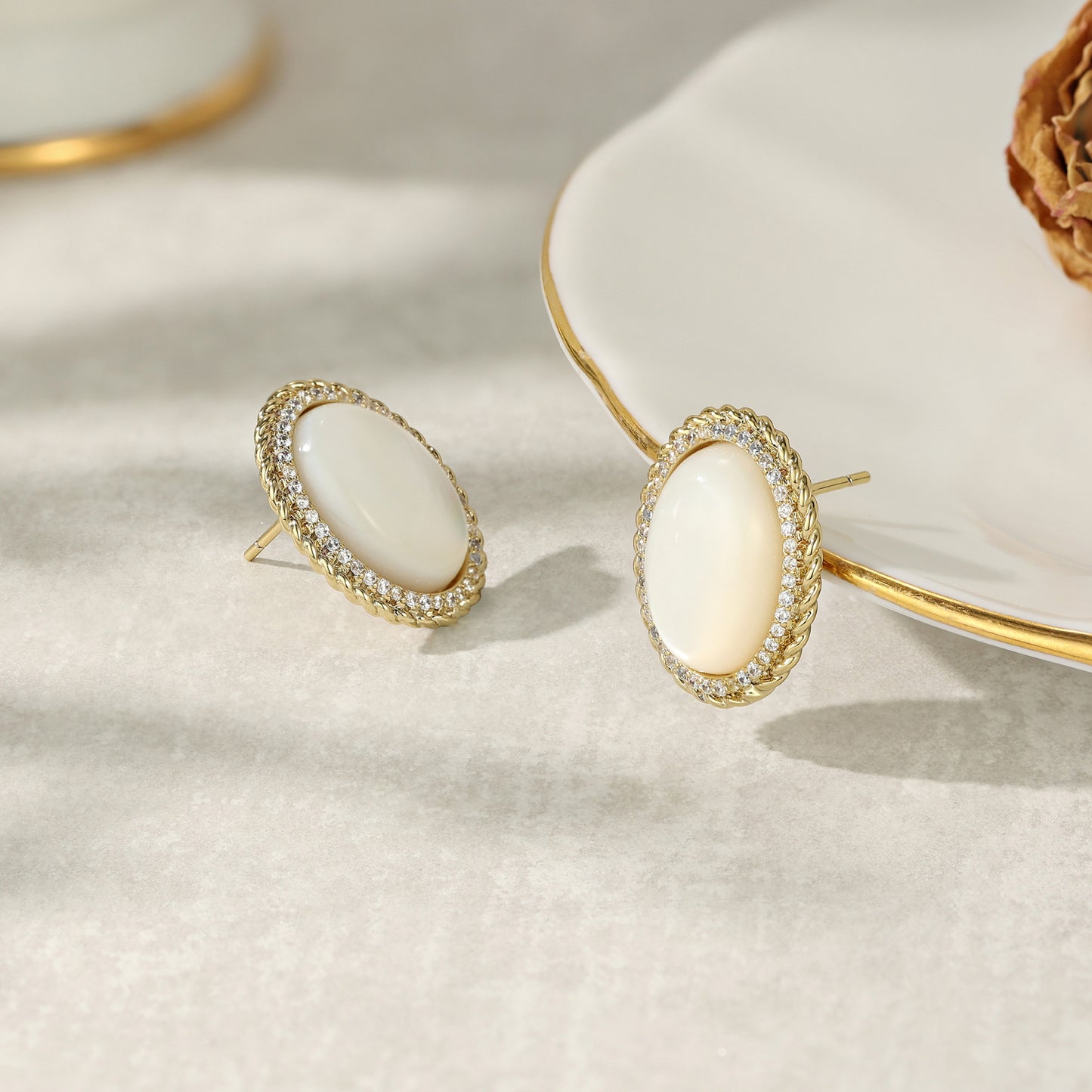 Italian designer mother-of-pearl earrings